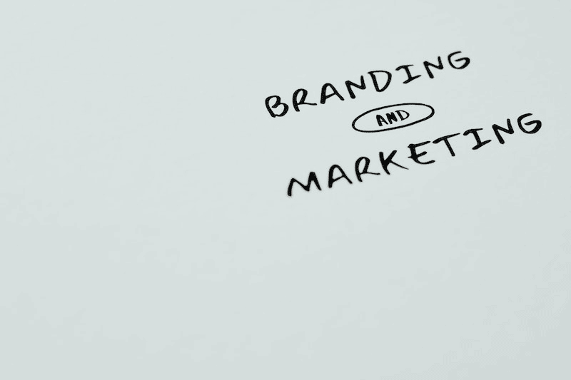 What Is Website Marketing? 14 The words "branding and marketing" written with a marker