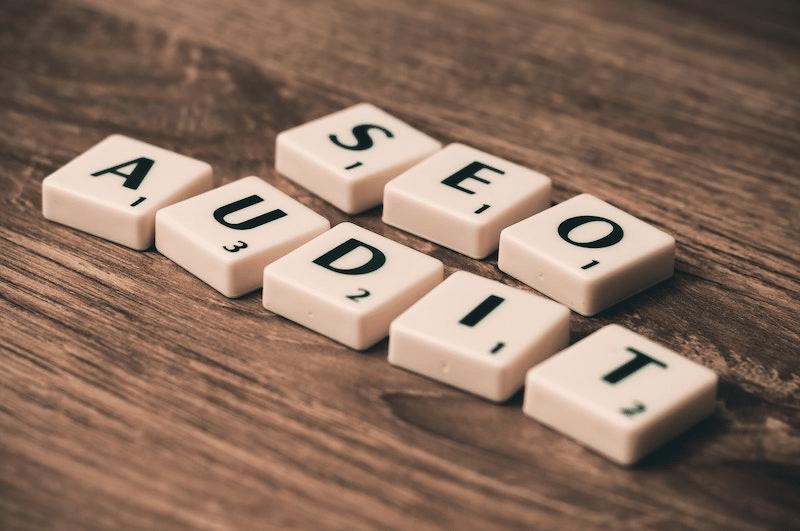 Best Alexandria SEO Company| WP Wizards 15 The words SEO AUDIT written with scrabble tiles