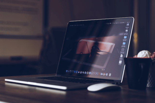 Updraftplus: The Best WordPress Backup Plugin 7 A laptop on a desk