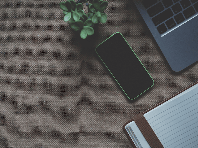 Updraftplus: The Best WordPress Backup Plugin 8 A laptop and a phone