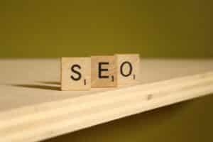 WordPress SEO Services- Optimizing WordPress Websites for Top-Notch SEO 10 a wooden block that says seo on it