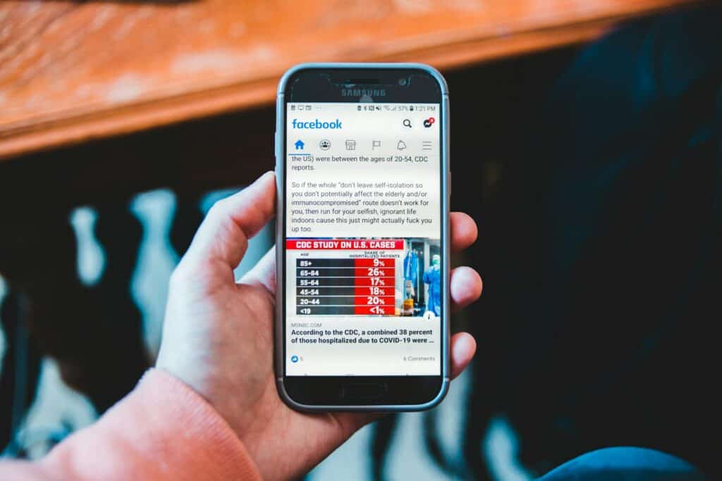 The Ultimate Guide to Banner Advertising for Small Businesses 13 person holding black samsung android smartphone