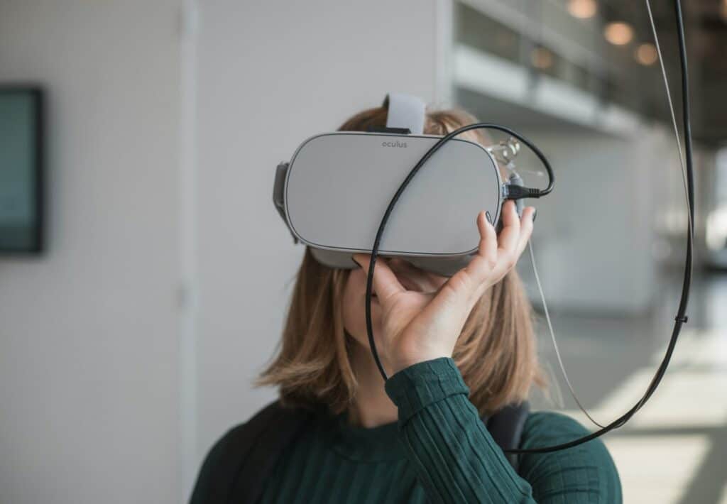 5 Game-Changing Web Technologies You Need to Know About 18 woman in black sweater holding white and black vr goggles