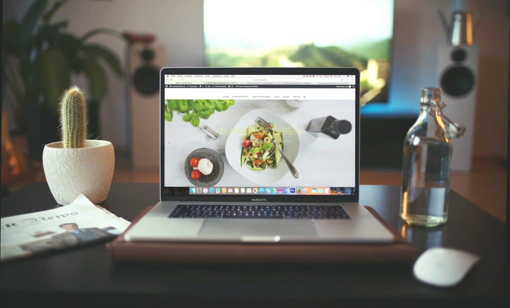 The Ultimate Guide on How To Make Your Own Website with Priceless Consulting 37 MacBook Pro showing vegetable dish