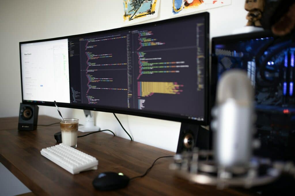 Understanding the Art of Web Application Development in the Digital Age 11 turned-on flat screen monitor