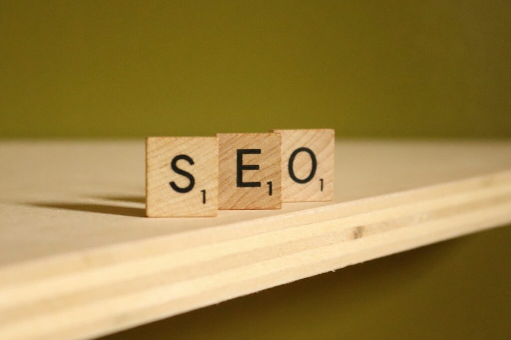 Maximizing Your Business Potential with Content Development 19 a wooden block that says seo on it