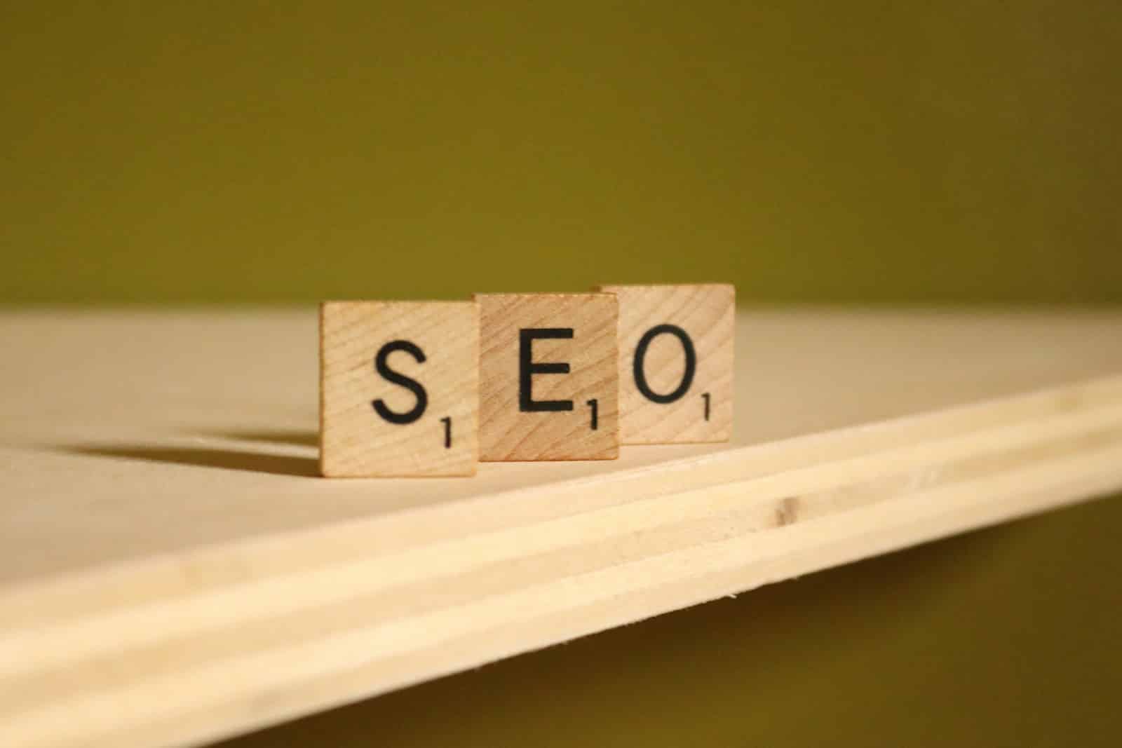 Mastering SEO Web Design for Small Businesses 17 a wooden block that says seo on it