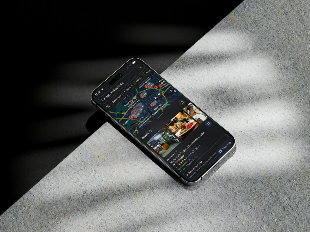 How to Get Google Reviews for Your Small Business 12 A cell phone sitting on top of a table