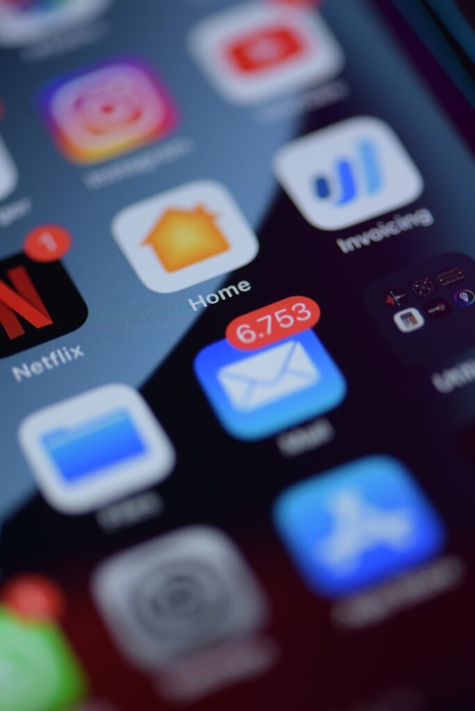 Best Email Hosting for Small Business Success in 2025 17 a close up of a cell phone with various app icons