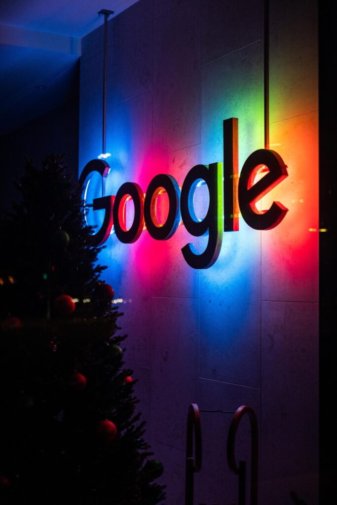 Partnering with a Google Ads Company for Small Business Growth | Priceless Consulting Should Be Your Top Choice For Google Campaign Management 16 the google logo is lit up at night