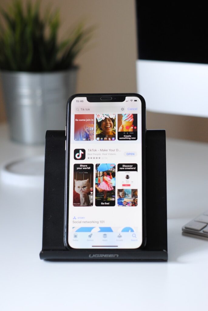 Social Media Presence: How to Elevate Your Business in 10 Simple Steps 17 iphone xs on white table