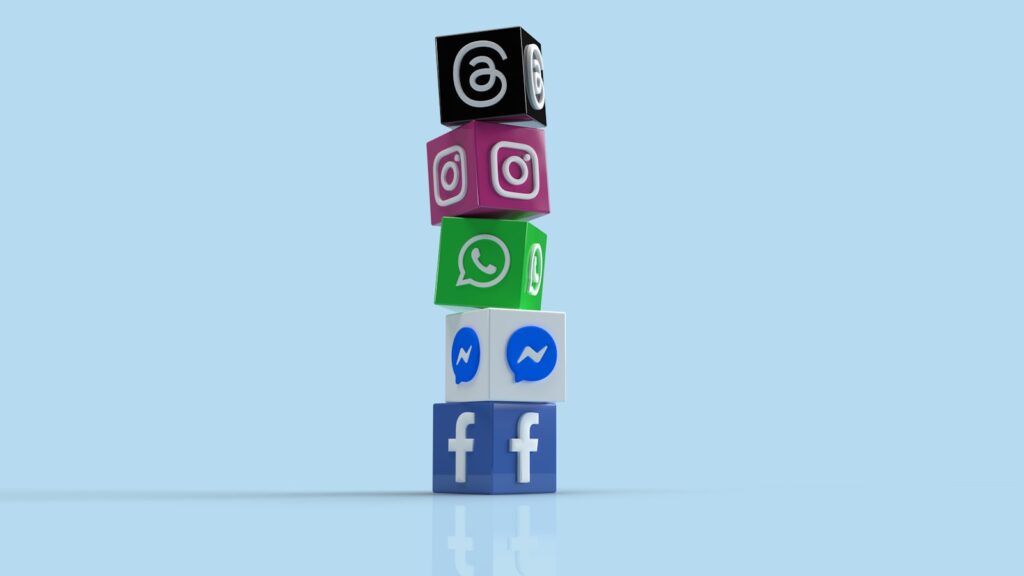 Social Media Checks | Audits to Keep Your Strategy On Track 3 a stack of colorful blocks with social icons on them
