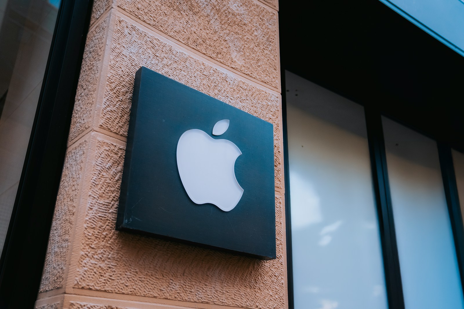 An apple sign on the side of a building 5 (Corporate Branding) Lessons from Companies That Nailed Their Rebrands